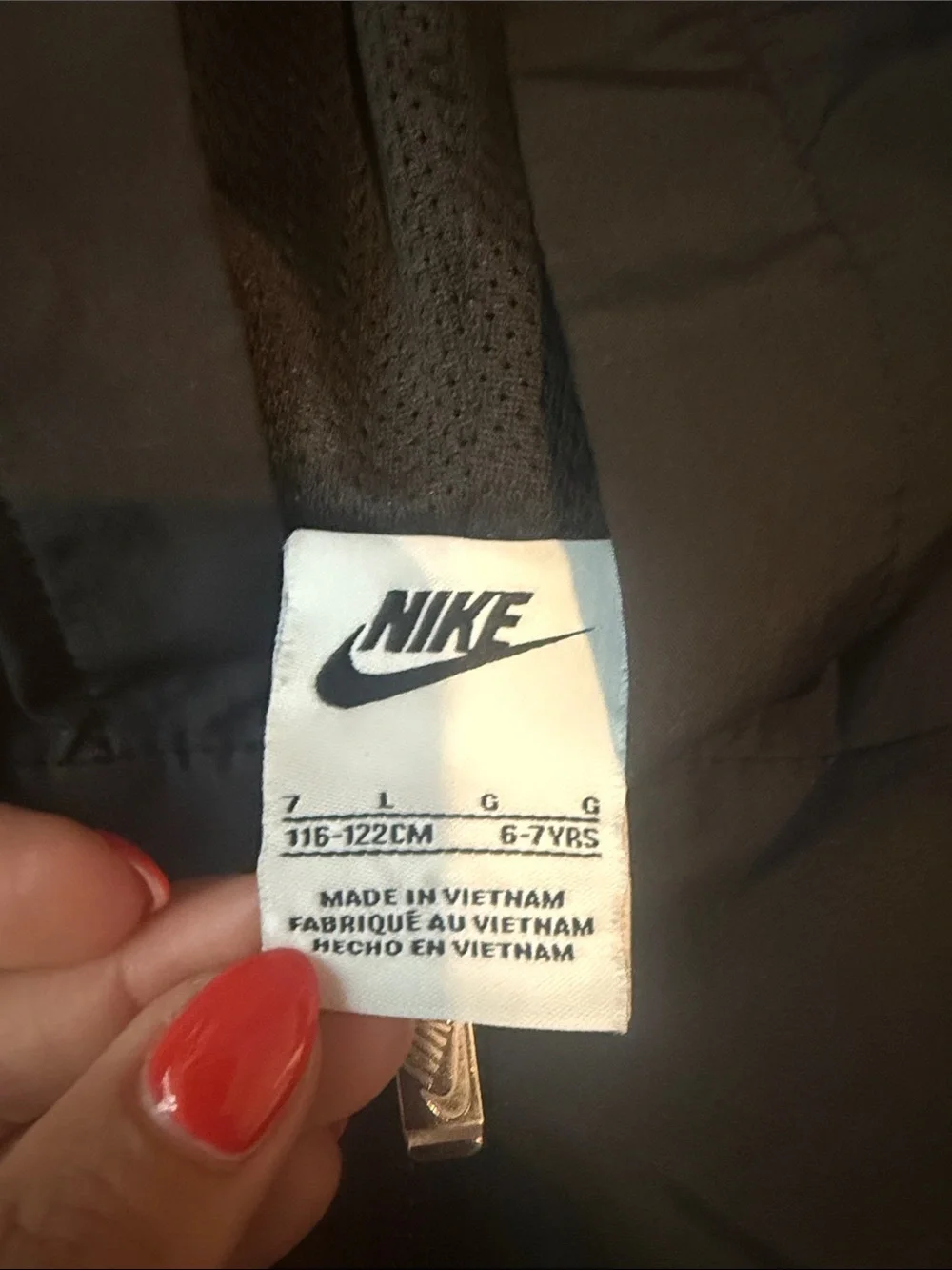 Nike Kids Black Hooded Rain Jacket with White Logo